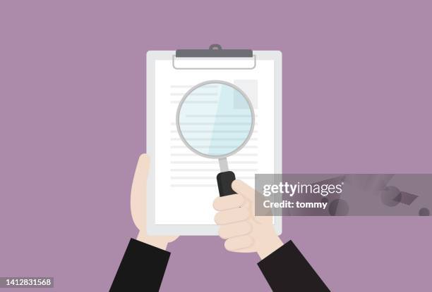 the manager inspected a resume with a magnifying glass - choosing candidate stock illustrations