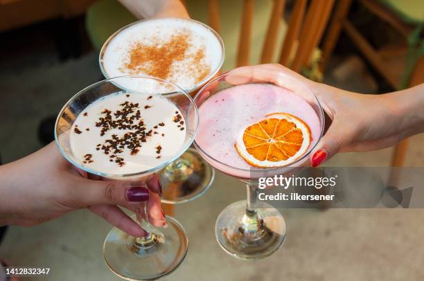 celebrating with cocktails - gin tasting stock pictures, royalty-free photos & images