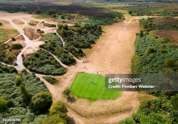 An aerial view of Burley Golf Club in the New Forest, on August 04, 2022 in Burley, England. The south of England has experienced the driest July...