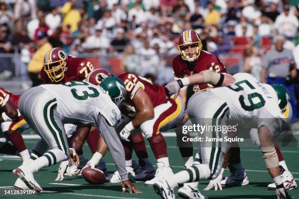 Gus Frerotte, Quarterback for the Washington Redskins calls the play on the line of scrimmage during the National Football Conference East Division...