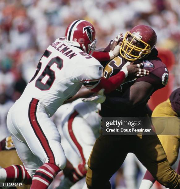 Chris Doleman, Defensive End for the Atlanta Falcons blocks Ray Brown, Offensive Guard for the Washington Redskins during their National Football...