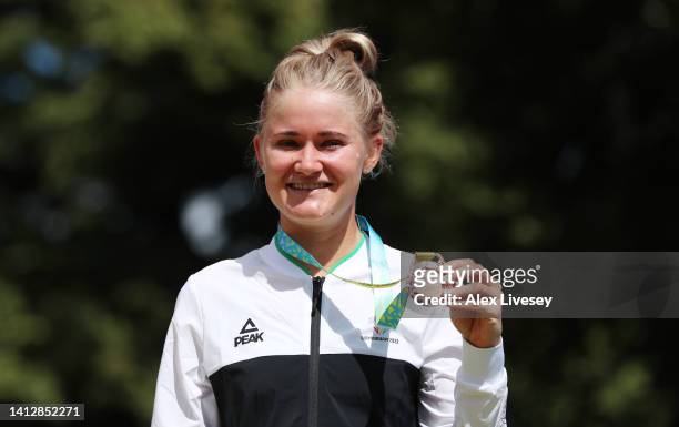 Bronze Medalist, Georgia Williams of Team New Zealand celebrates with their medal during the Women's Individual Time Trial medal ceremony on day...