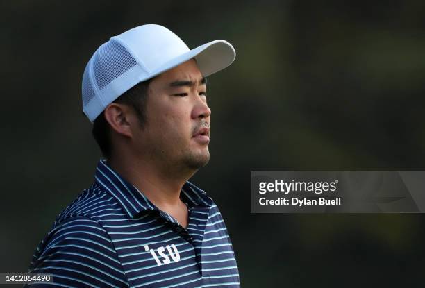John Huh of the United States walks on the first green during the first round of the Wyndham Championship at Sedgefield Country Club on August 04,...