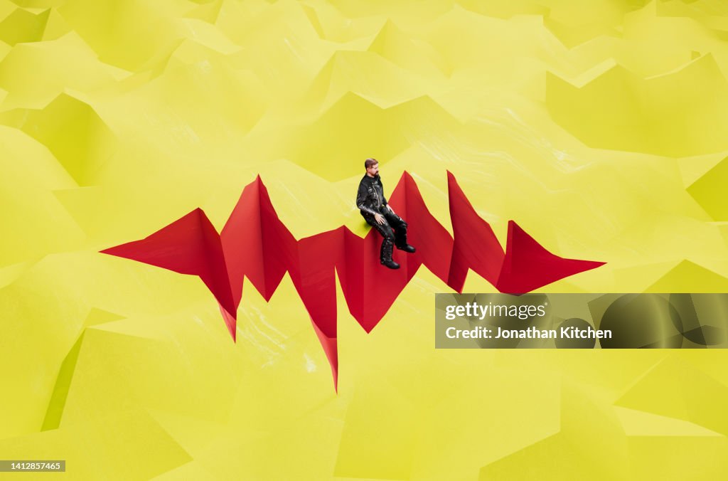 Man on hole in ground