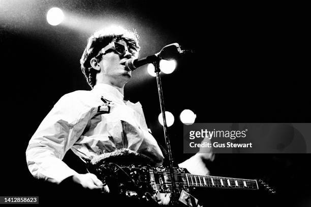 Mark Mothersbaugh of Devo performs on stage at the Hammersmith Odeon, London, England, on December 2, 1978.