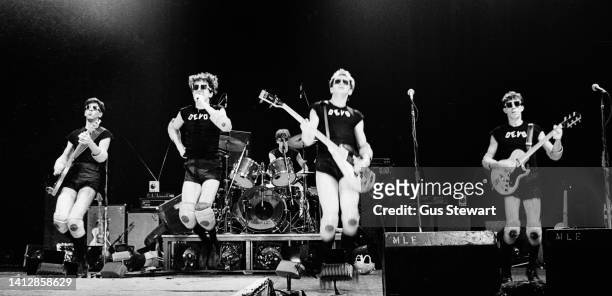 Devo perform on stage at the Hammersmith Odeon, London, England, on December 2, 1978.
