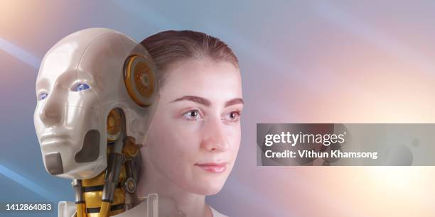 digital technology human and artificial intelligence robot face for innovation and futuristic. - artificial intelligence robot face stock pictures, royalty-free photos & images
