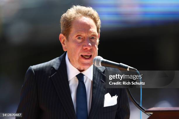 New York Yankees radio broadcaster John Sterling emcees the Old Timers Day Ceremony before a game between the Kansas City Royals and New York Yankees...