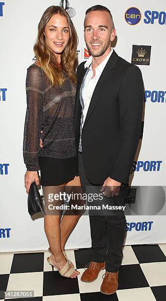 Helen Cauchi and Grant Smillie arrive at the opening party of the 2012 Australian Grand Prix at Club 23 on March 14, 2012 in Melbourne, Australia.