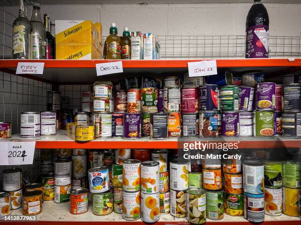 Donated food is seen stored on shelves inside a food bank, on May 15, 2022 in Bristol, England. Food bank charities across the UK are reporting a...