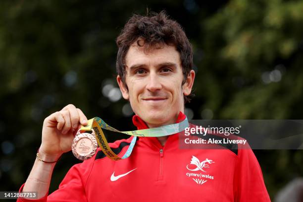 Bronze Medalist, Geraint Thomas of Team Wales poses with their medal during the Men's Individual Time Trial medal ceremony on day seven of the...