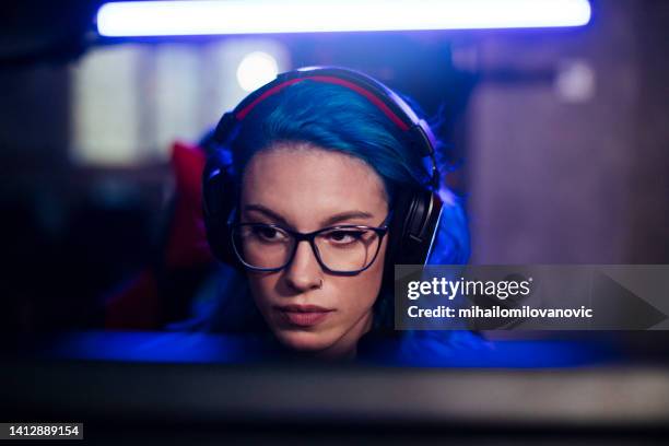 close-up of a gamer girl - blue hair stock pictures, royalty-free photos & images