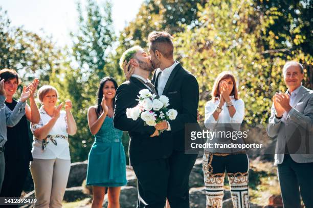 gay marriage party - asian lesbians kiss stock pictures, royalty-free photos & images