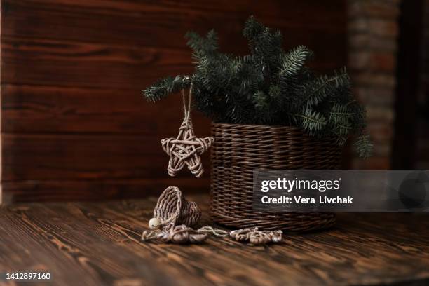 christmas presents on wooden table. - christmas candles stock-fotos und bilder