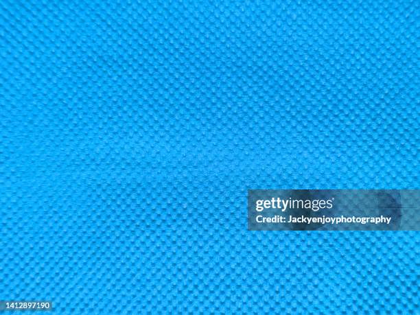 the blue tissue paper's background - crepe stock pictures, royalty-free photos & images