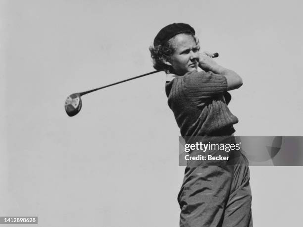 Dorothée Lally Segard , Vicomtesse de Saint Sauveur from France follows her shot as she drives off the tee during practice for the 1936 Girls Amateur...