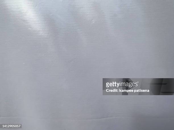 grey textured tarpaulin canvas textile - regnkläder bildbanksfoton och bilder