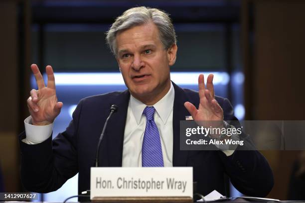 Director Christopher Wray testifies during a hearing before Senate Judiciary Committee at Hart Senate Office Building on Capitol Hill August 4, 2022...