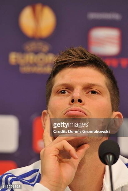 Klaas-Jan Huntelaar of Schalke reacts during a press conference ahead of their UEFA Europa League round of 16 second leg match against FC Twente at...