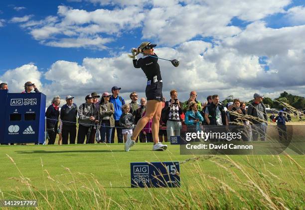 Charley Hull of England plays her tee shot on the 15th hole during the first round of the AIG Women's Open at Muirfield on August 04, 2022 in...