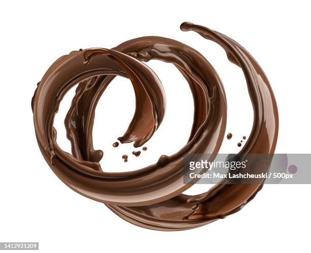 chocolate splash isolated on white background - syrup splash stock pictures, royalty-free photos & images