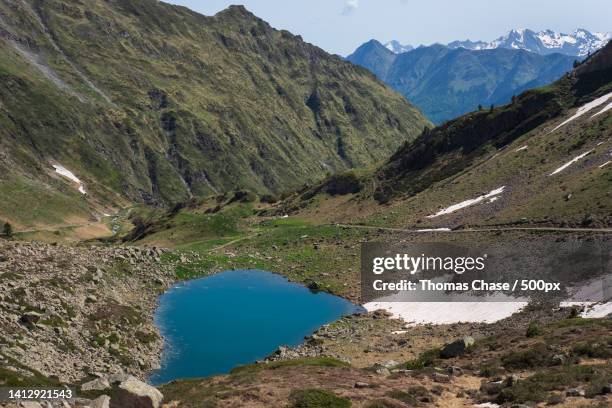 scenic view of lake and mountains against sky,cauterets,france - midirock stock pictures, royalty-free photos & images