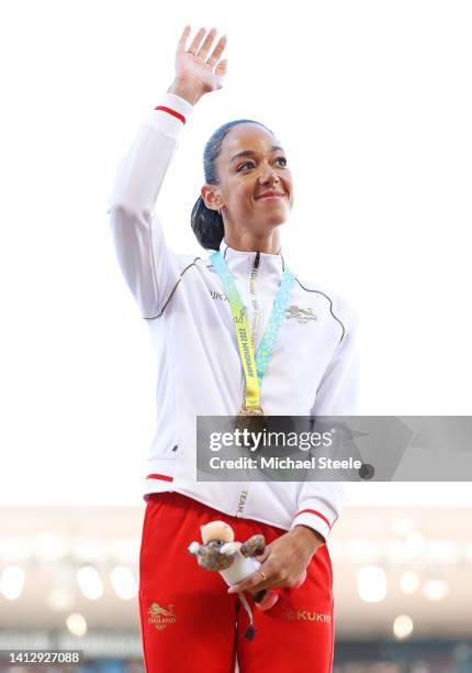 Gold medallist Katarina Johnson-Thompson of Team England celebrates during the medal ceremony for the Women's Heptathlon on day seven of the...