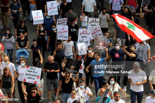 Families of victims and participants march to mark the second anniversary of Beirut blast, on August 4, 2022 in Beirut, Lebanon. Whilst...