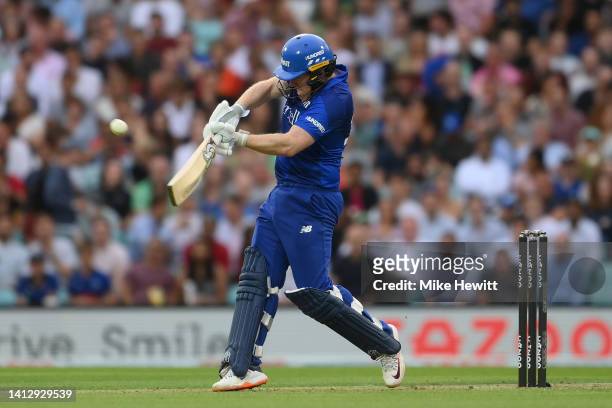 Eoin Morgan of London Spirit Men hits a six during The Hundred match between Oval Invincibles Men and London Spirit Men at The Kia Oval on August 04,...