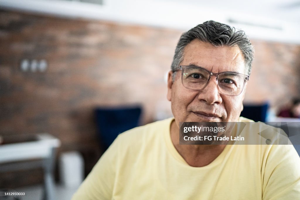 Portrait of mature man at home
