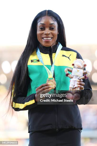 Gold medalist Elaine Thompson-Herah of Team Jamaica poses for a photo during the medal ceremony for the Women's 100m Final on day seven of the...