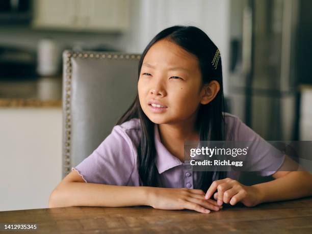 child experiencing vision difficulties - squinting stock pictures, royalty-free photos & images