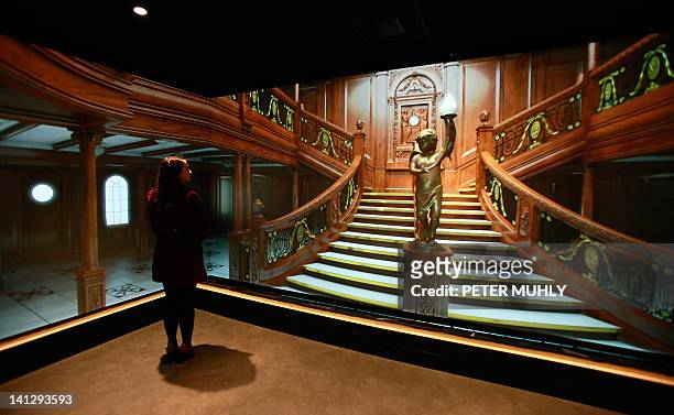 Replica of a Main Staircase aboard the Titanic ship is pictured at the Titanic Belfast visitor centre in Belfast, Northern Ireland, on March 13,...