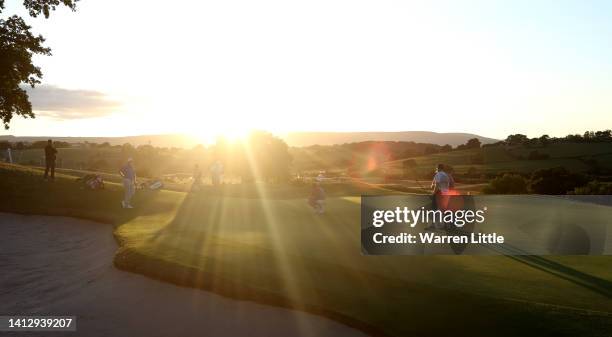 Eddie Pepperell of England lines up a putt on the 18th green during the first round of the Cazoo Open at Celtic Manor Resort on August 04, 2022 in...