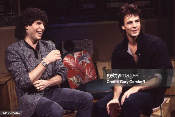 Mark Goodman laughs with Australian-American Pop musician and actor Rick Springfield during an interview on MTV at Teletronic Studios, New York, New...