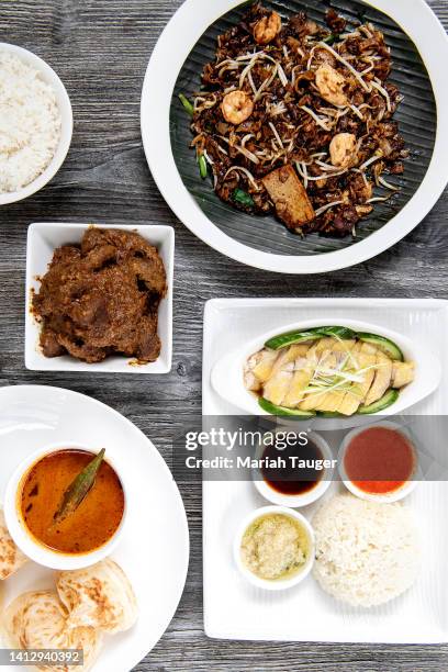 An array of dishes at Ipoh Kopitiam by chef Kenji Tang are photographed for Los Angeles Times on March 31, 2022 in Alhambra, California. PUBLISHED...