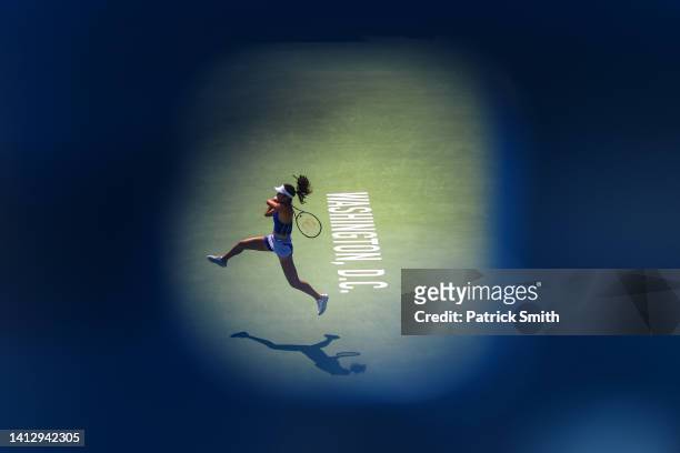 Emma Raducanu of Great Britain returns a shot to Camila Osorio of Colombia during Day 6 of the Citi Open at Rock Creek Tennis Center on August 04,...