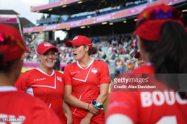Katherine Brunt and Nat Sciver of Team England look on from the huddle during the Cricket T20 Group B match between Team England and Team New Zealand...