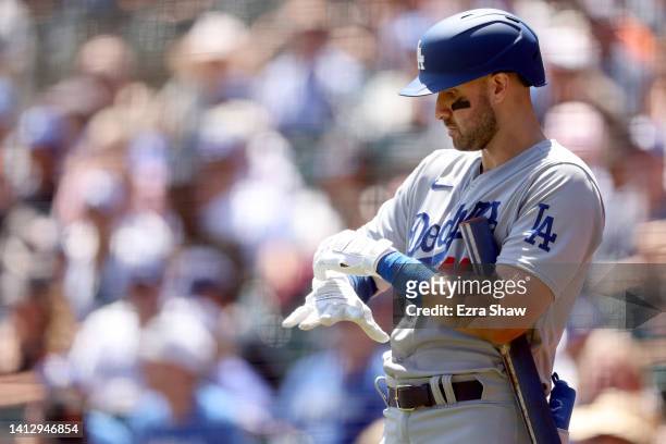 Joey Gallo of the Los Angeles Dodgers gets ready to take his first at-bat as a Dodger in the second inning against the San Francisco Giants at Oracle...