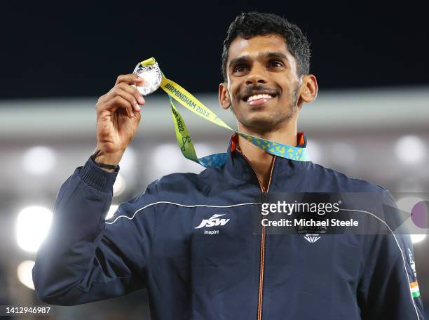 Silver medalist Sreeshankar Sreeshankar of Team India poses for a photo during the medal ceremony for the Men's Long Jump Final on day seven of the...