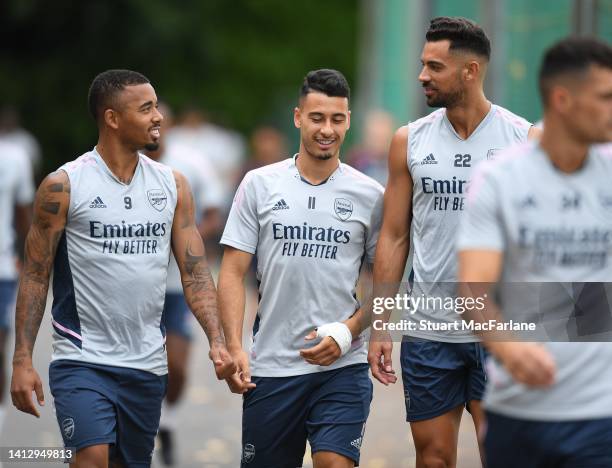 Gabriel Jesus, Gabriel Martinelli and Pablo Mari of Arsenal during a training session at London Colney on August 04, 2022 in St Albans, England.