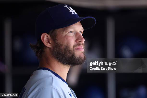 Clayton Kershaw of the Los Angeles Dodgers stands in the dugout during their game against the San Francisco Giants at Oracle Park on August 04, 2022...