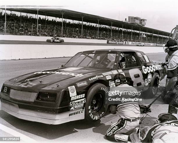 Late-1980s: Dale Earnhardt makes a pit stop in his Dale Earnhardt, INC Chevrolet Monte Carlo during a NASCAR Busch Grand National race at Darlington...