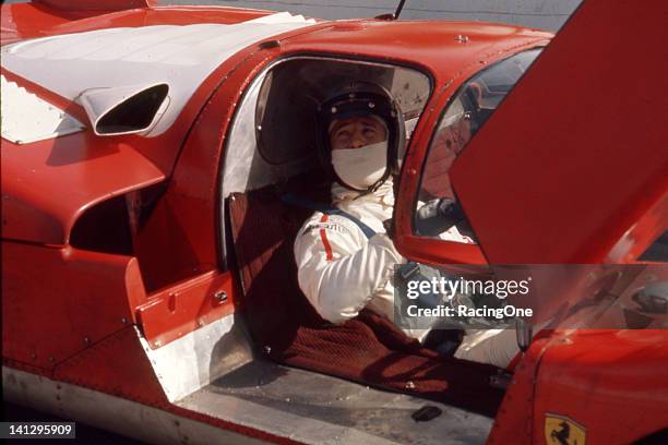 January 1970: Mario Andretti gets set to take a Ferrari 512S out for some practice laps prior to the 24 Hours of Daytona at Daytona International...