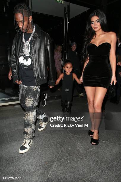 Travis Scott, Stormi Webster and Kylie Jenner are seen having dinner at Nobu Portman Square on August 04, 2022 in London, England.