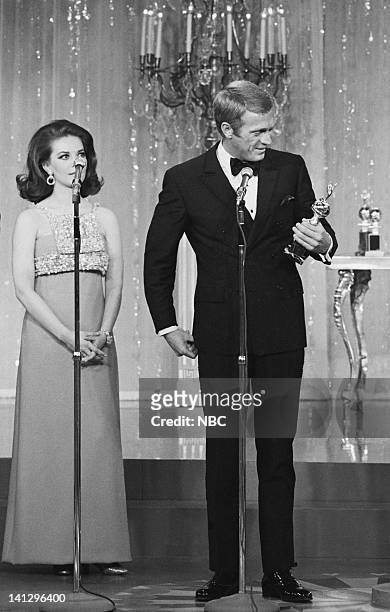 Pictured: Actress Natalie Wood and Golden Globe winner of the Henrietta Award Steve McQueen on stage during the 24th Annual Golden Globe Awards at...