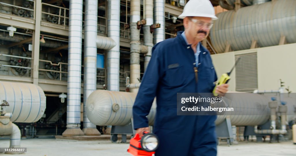Power Plant Foreman Walking Out of Frame