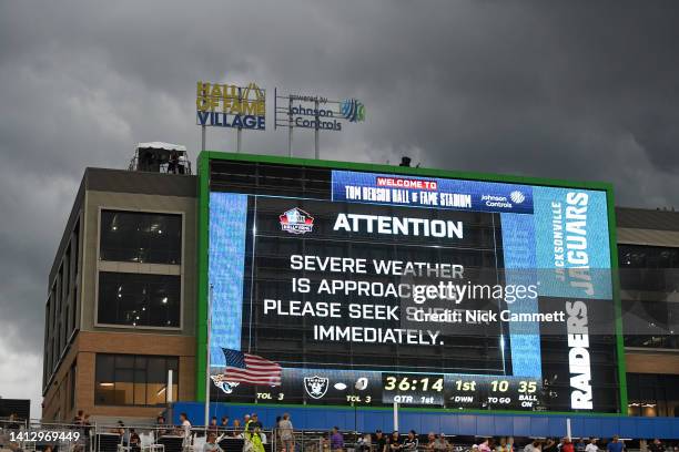 View of the scoreboard as severe weather delays the start of the 2022 Pro Hall of Fame Game between the Jacksonville Jaguars and the Las Vegas...
