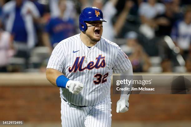 Daniel Vogelbach of the New York Mets reacts to his solo home run against the Atlanta Braves in the third inning at Citi Field on August 04, 2022 in...