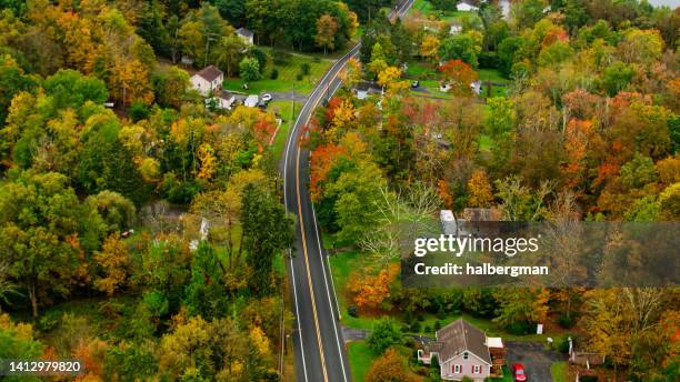 aerial view of houses and fall colors in montague, new jersey - new jersey home stock pictures, royalty-free photos & images